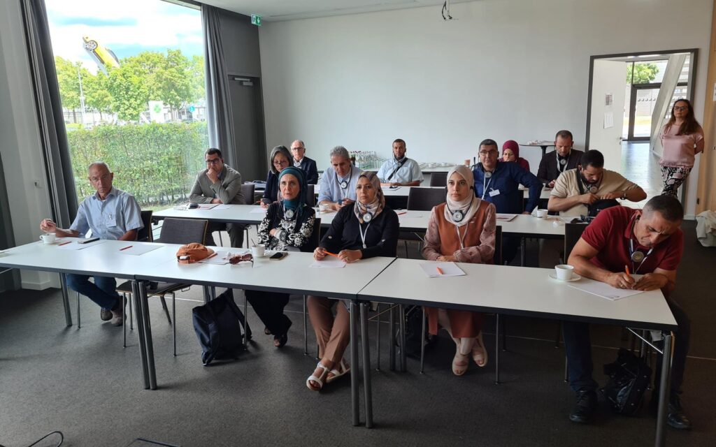 A picture taken on 20.07.2023 during the Bavaria - Fit for Partnership event. In one of the conference rooms of the MVC, participants can be seen listening intently to the speaker.